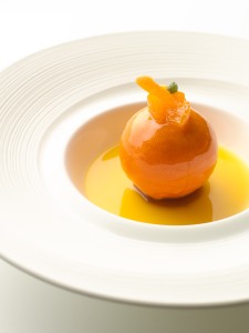 Candied whole Clementine with panna cotta and sorbet, on a light Earl Grey jelly
