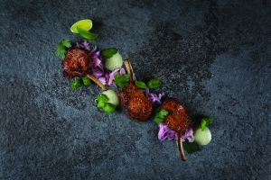 Charcoal grilled baby lamb chops, harissa, yoghurt, dried chilli paste, pickled onions